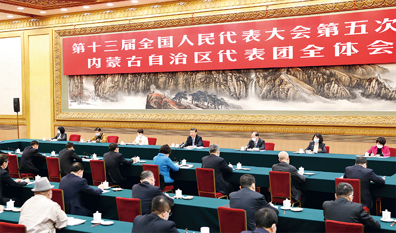 习近平：新时代党和人民奋进的必由之路